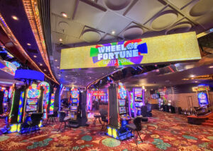 WOF small plaza IGT and Plaza Casino celebrate exclusive Wheel of Fortune Slots Zone