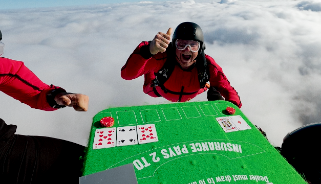 Skydivers play blackjack at 13,000ft while plunging towards Earth at 120mph