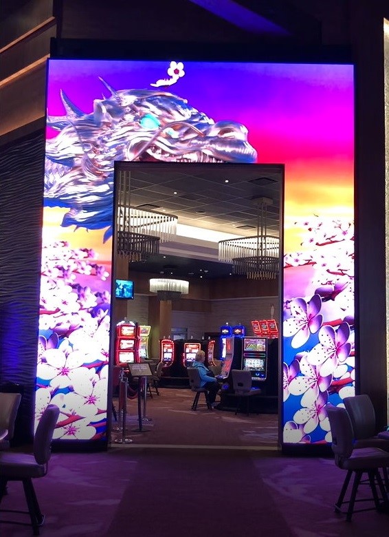 JCM installs digital signage arch at Angel Of The Winds Casino